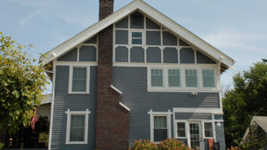 A home with brand new light-blue James Hardie siding