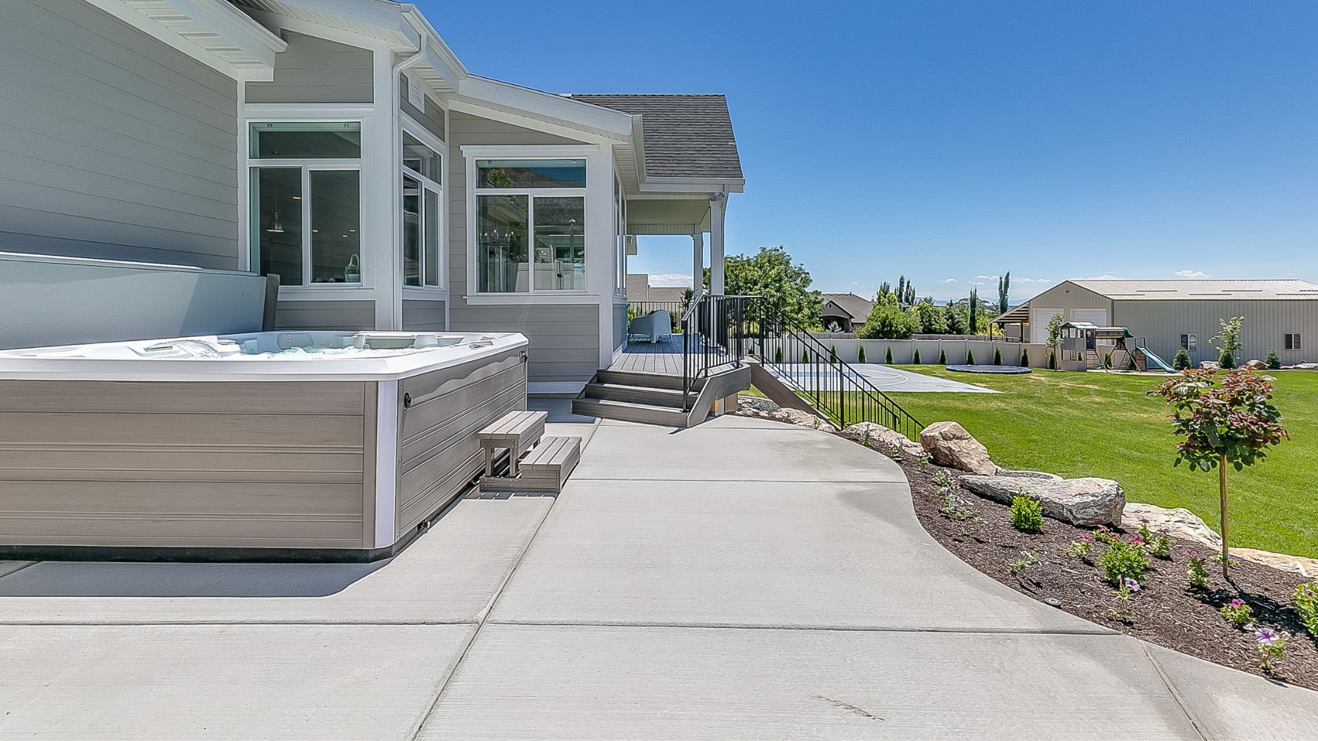 concrete patio with hot tub